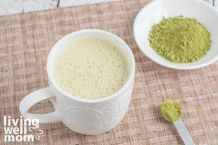 matcha green tea latte in a white mug