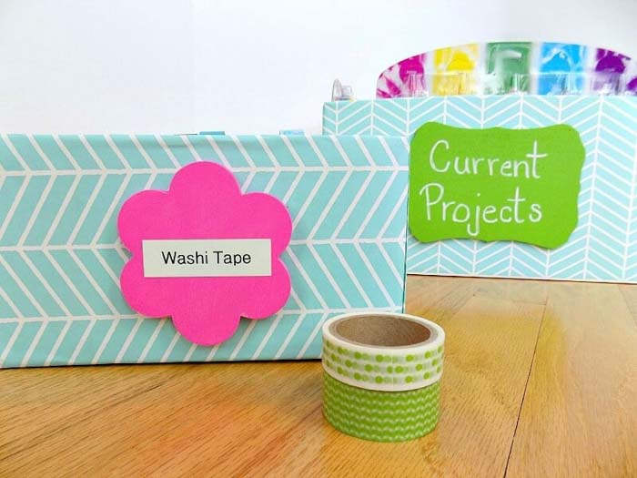 pink and lime green wooden labels on a box
