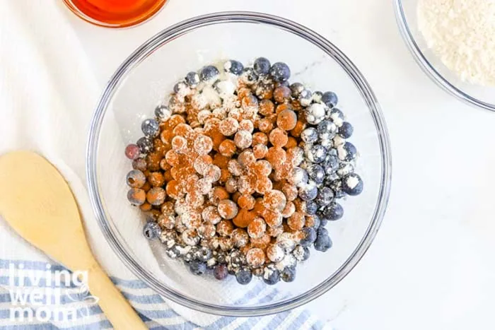 coating berries in sugar and cinnamon