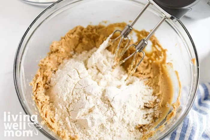 adding flour to recipe