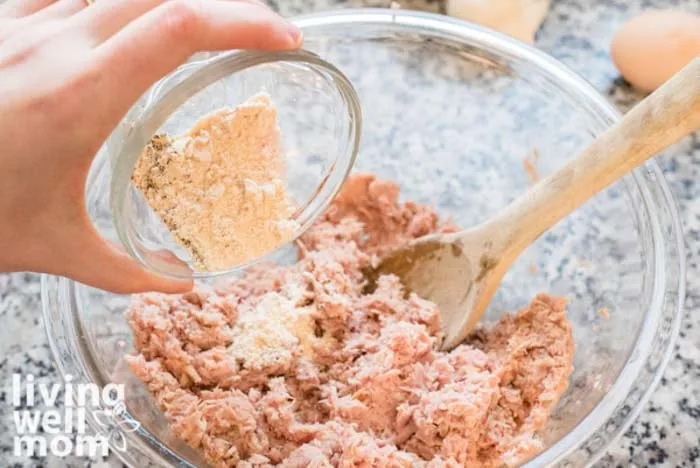 adding ingredients to bowl