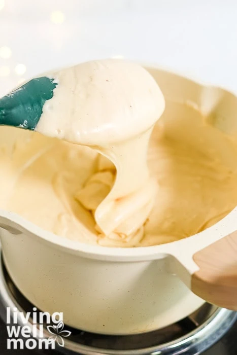 Smooth eggnog fudge mixture ready to pour into a pan.