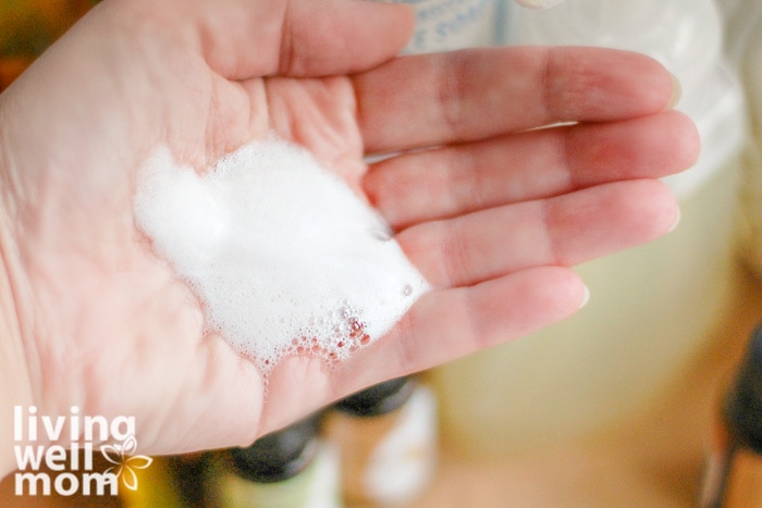 washing hands with foaming hand soap