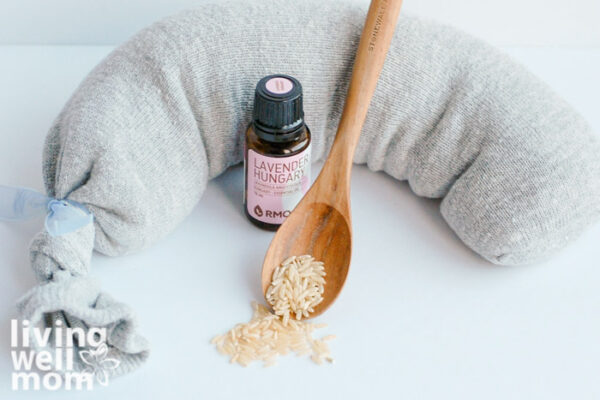 DIY rice heating pad with bottle of lavender oil 