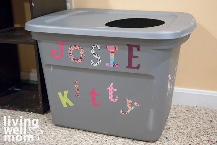 large gray plastic container repurposed into a mess-free cat litter box