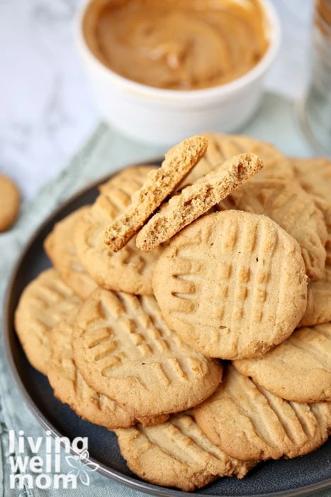 Pile of chewy peanut butter cookies on a plate