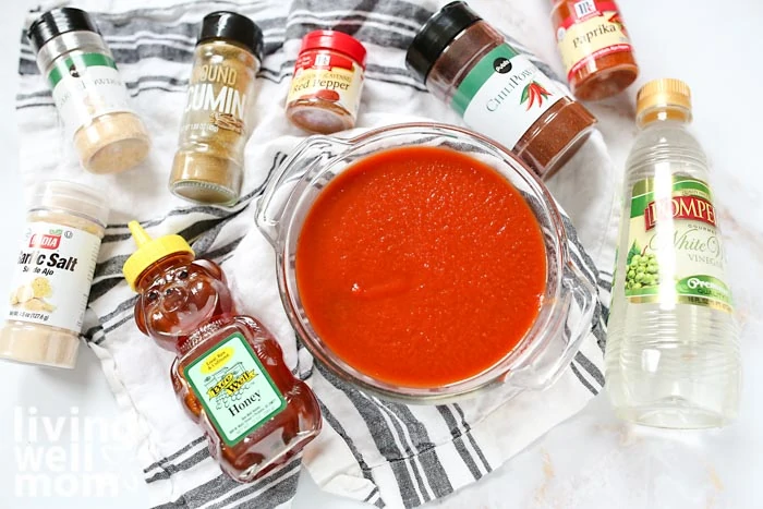 pureed tomato, spices, vinegar, and honey on a counter