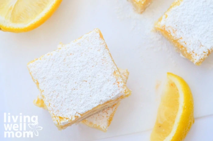 gluten-free lemon bars with slices of lemons