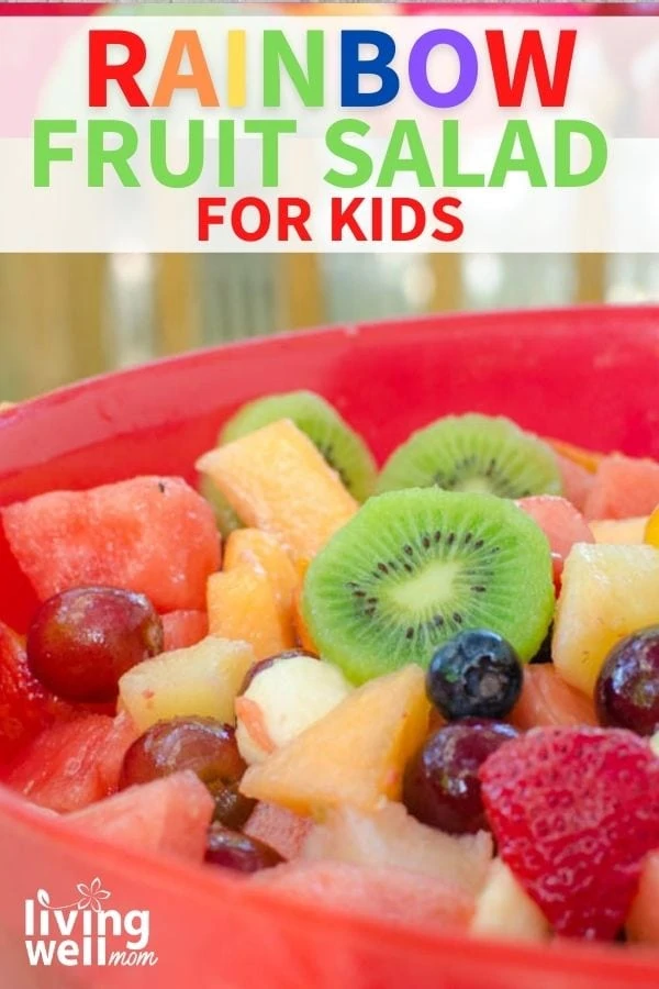 Rainbow fruit salad in a red bowl