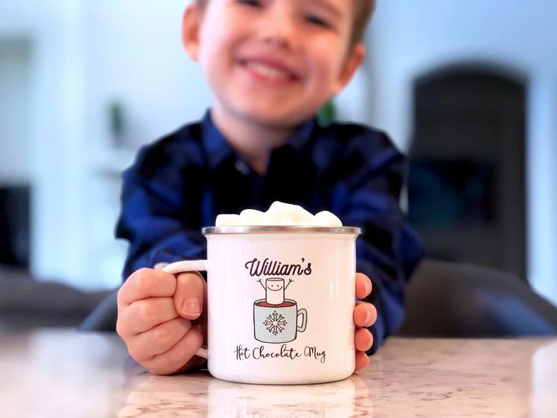 boy with a mug of hot cocoa