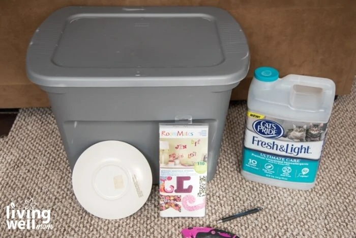 gray plastic bin, plate, cat litter, supplies to make own cat litter box