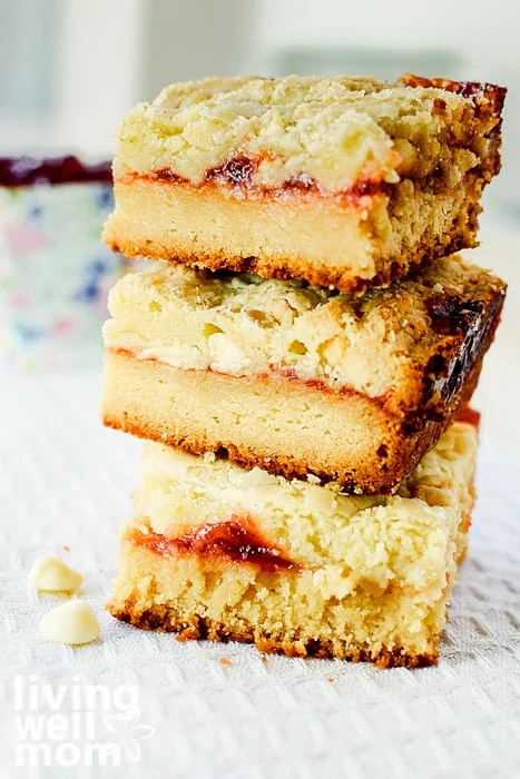 stack of bars with white chocolate, raspberry, and almond