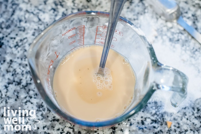 tapioca starch and beef broth in a measuring cup