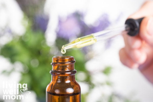 essential oils in front of white background