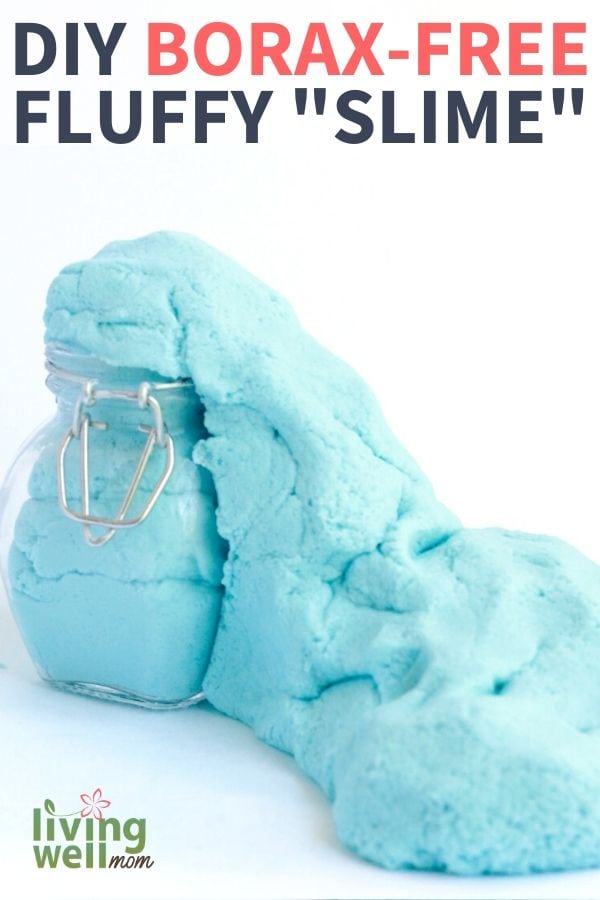 Glass jar with blue fluffy slime spilling out of it