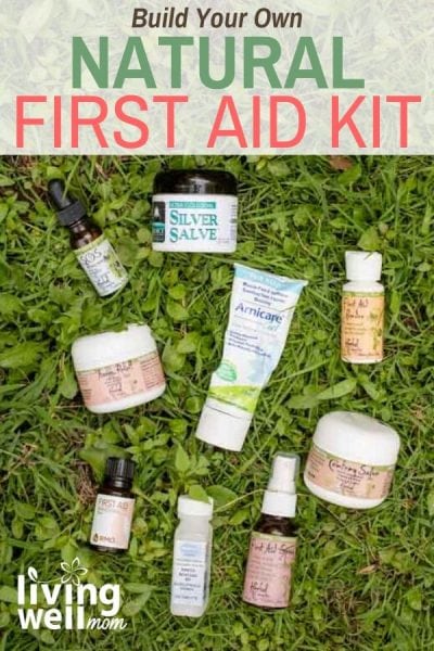Natural remedies and first aid kit supplies lying on the grass