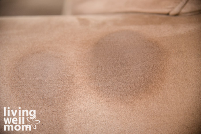 water on microfiber couch during cleaning