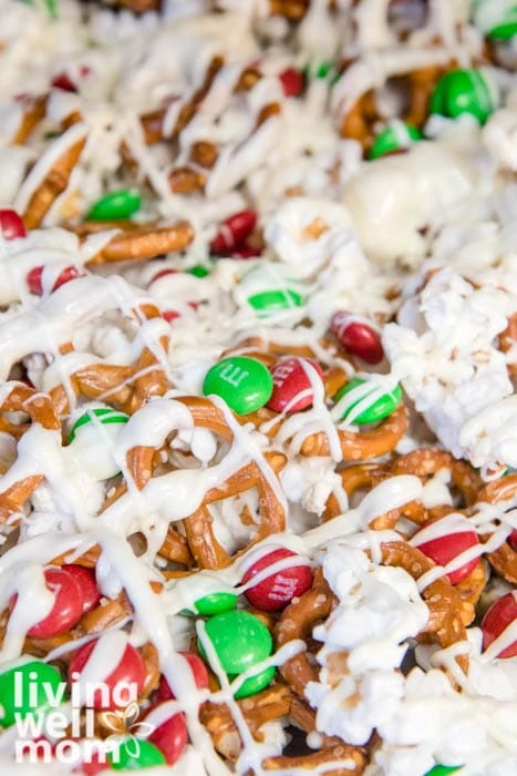 Close up of white chocolate popcorn with pretzels and m&ms