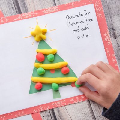 christmas tree play dough mat with colorful play doh child playing