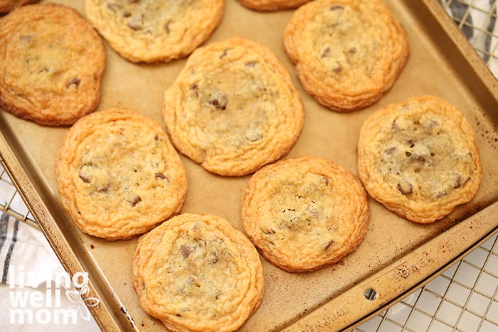 Freshly baked gluten free chocolate chip cookies on a baking sheet