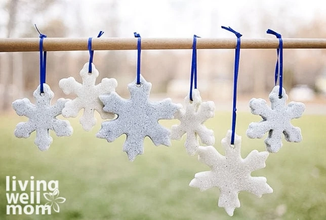 salt dough ornaments shaped like snowflakes hanging 