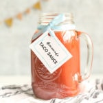 homemade taco sauce recipe made in a mason jar with a label