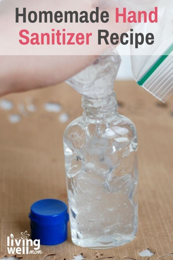squeezing homemade hand sanitizer into bottle