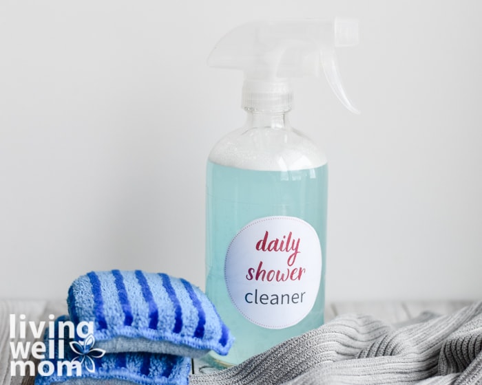 blue cleaning bottle with daily shower cleaner label
