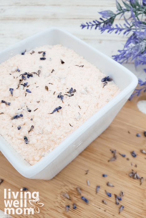 Glass dish of homemade bath salt with epsom salt. 