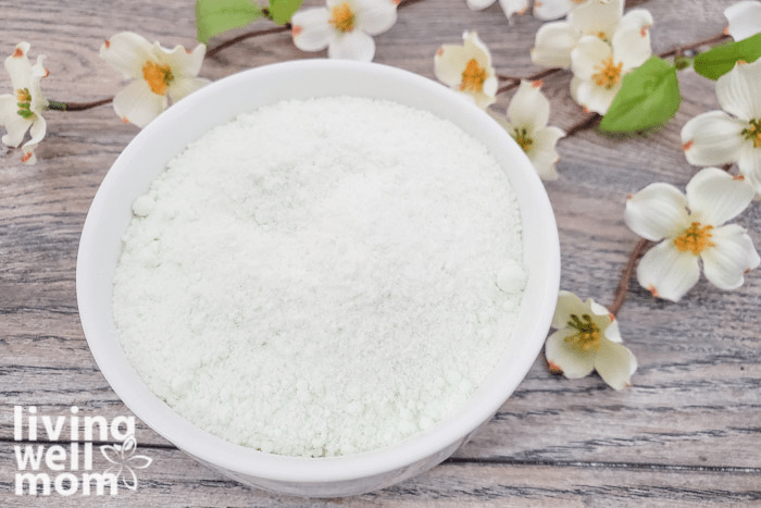 Bowl of DIY Fizzy Bath Salts with essential oil.