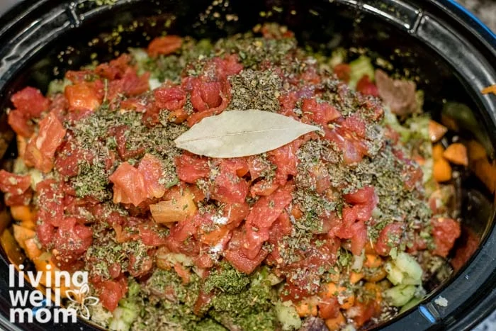 adding a bay leaf for seasoning healthy beef stew