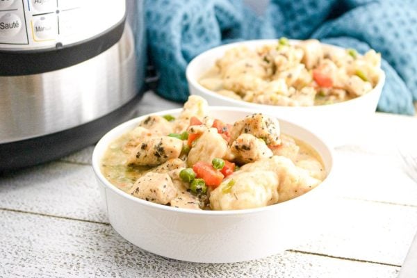 chicken and dumplings in a bowl with instant pot