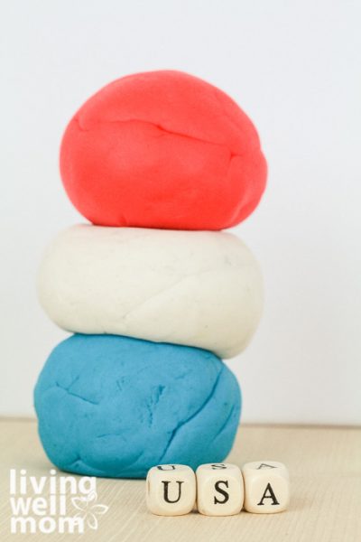 Red, white, and blue DIY playdough stacked together.