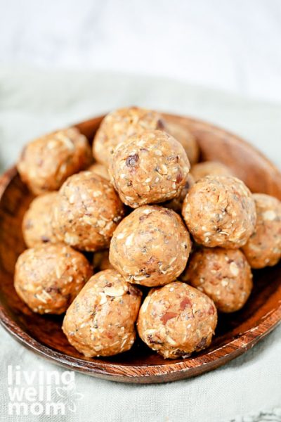 Close up of a bowl of energy balls with peanut butter