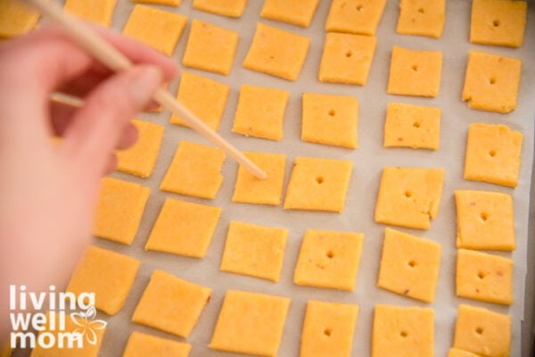 Poking a hole in homemade cheez it crackers