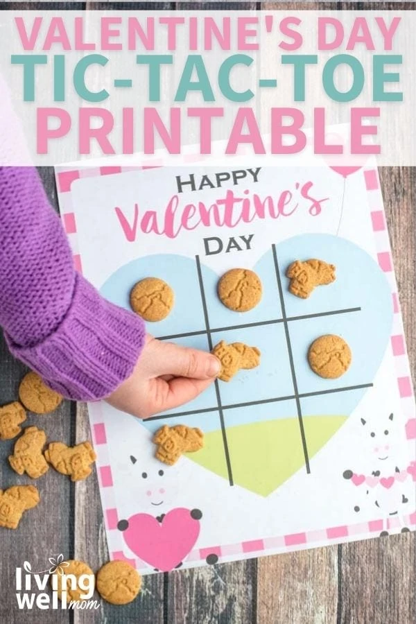 Child playing a tic tack toe valentine game 
