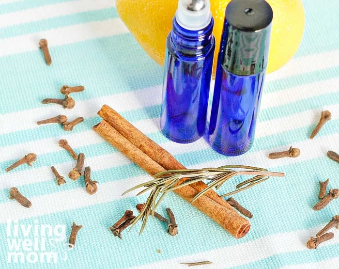 essential oil rollers with cinnamon stick
