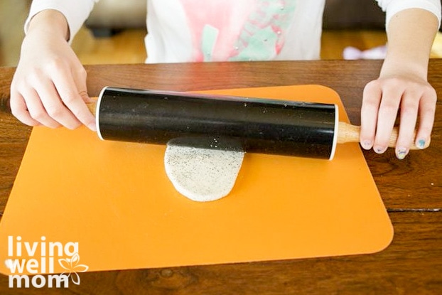 Rolling salt dough with a rolling pin