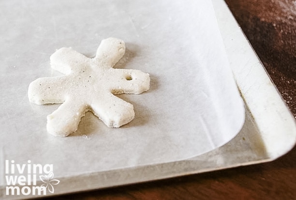 salt dough ornament drying on a cookie sheet