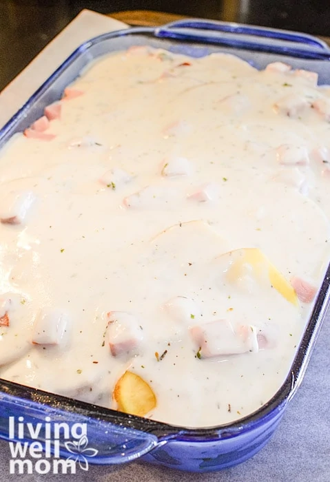 making a scalloped potato and ham casserole