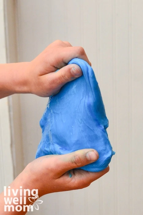 stretching out blue homemade gak